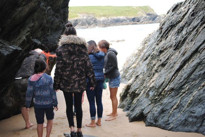 Exploring caves on the beach