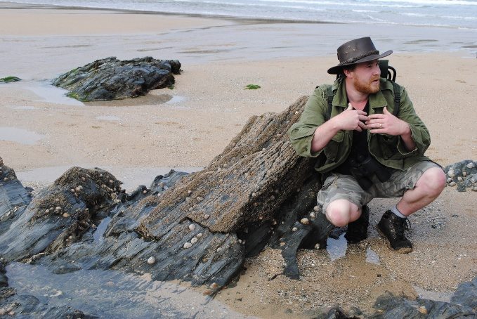 exploring rock pools on the beach 