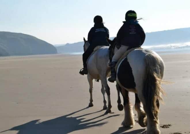Horse riding on Cornish beach