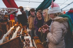 Shoppers at Fowey Christmas Market, Cornwall