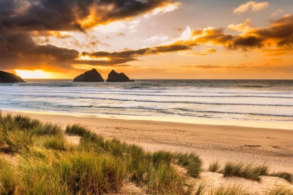 Holywell Bay Beach at sunset