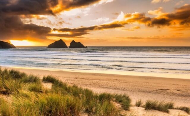 Holywell Bay Beach at sunset